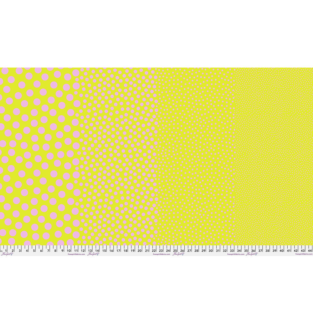 Stones in Cherry Limeade by Tula Pink — full-width fabric view showing four dot sizes.