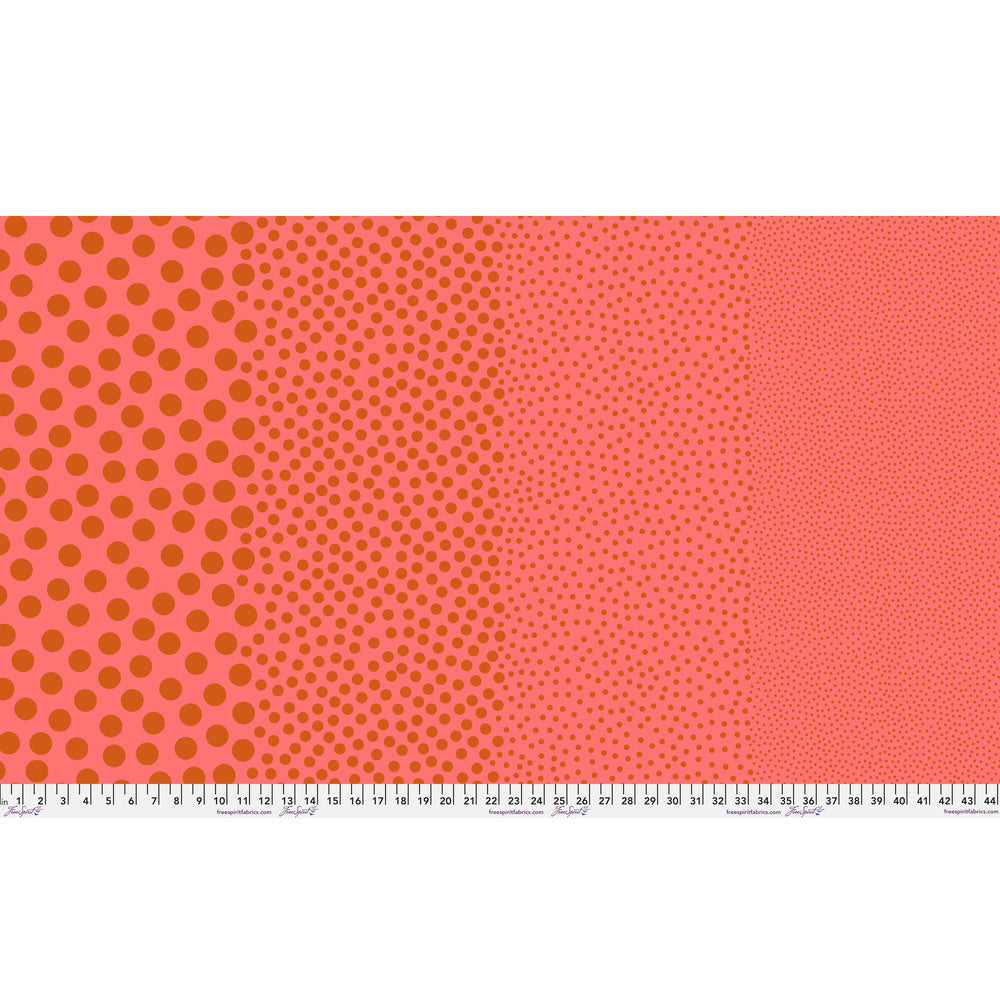 Stones in Clay by Tula Pink — full-width fabric view showing four dot sizes.