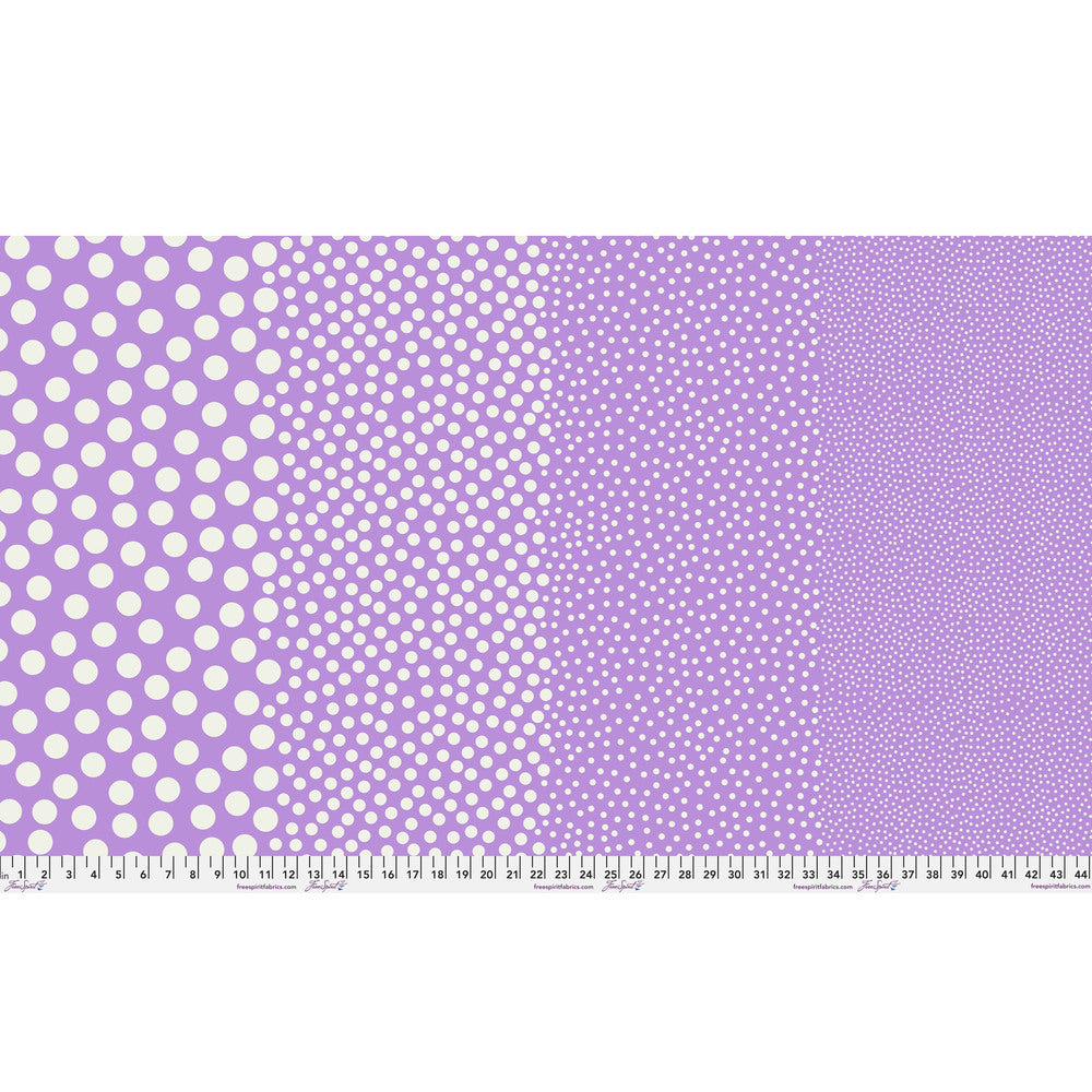 Stones in Lilac Lily by Tula Pink — full-width fabric view showing four dot sizes.