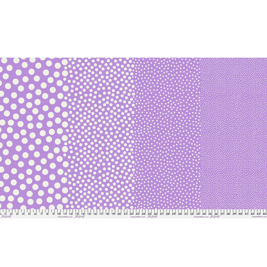 Stones in Lilac Lily by Tula Pink — full-width fabric view showing four dot sizes.
