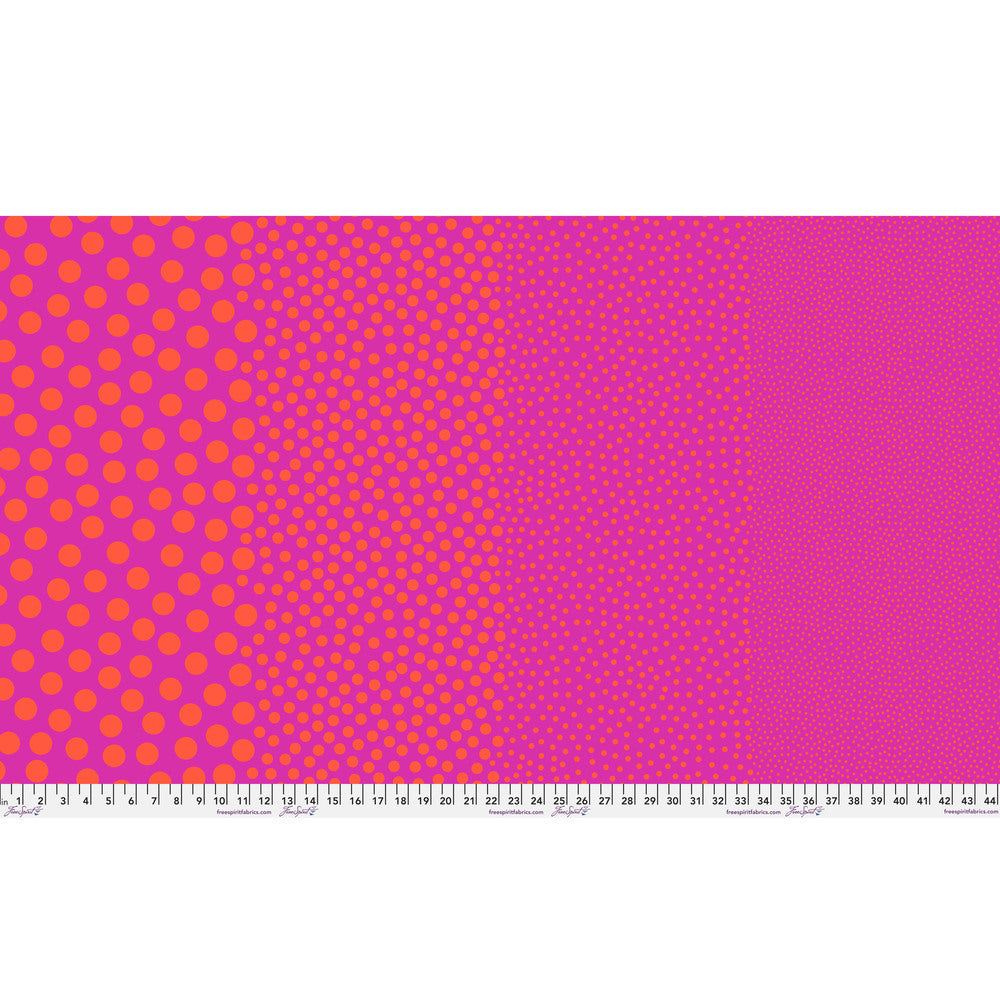 Stones in Pinkerberry by Tula Pink — full-width fabric view showing four dot sizes.